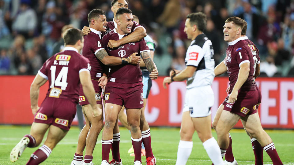 Queensland players, pictured here celebrating after winning the State of Origin opener.