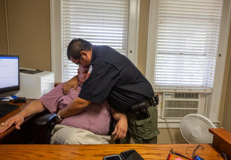 Constable David Valdez embraces Uvalde Justice of the Peace Eulalio Diaz as Diaz breaks down recounting having to identify the bodies of 19 children after they were shot by a gunman Tuesday in Uvalde, Texas.