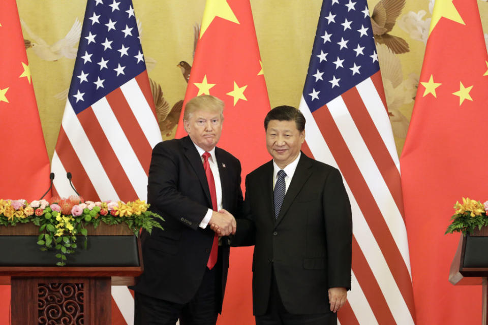 U.S. President Donald Trump, left, and Xi Jinping, China's president, shake hands during a news conference at the Great Hall of the People in Beijing, China, on Thursday, Nov. 9, 2017.<span class="copyright">Qilai Shen/Bloomberg via Getty Images</span>