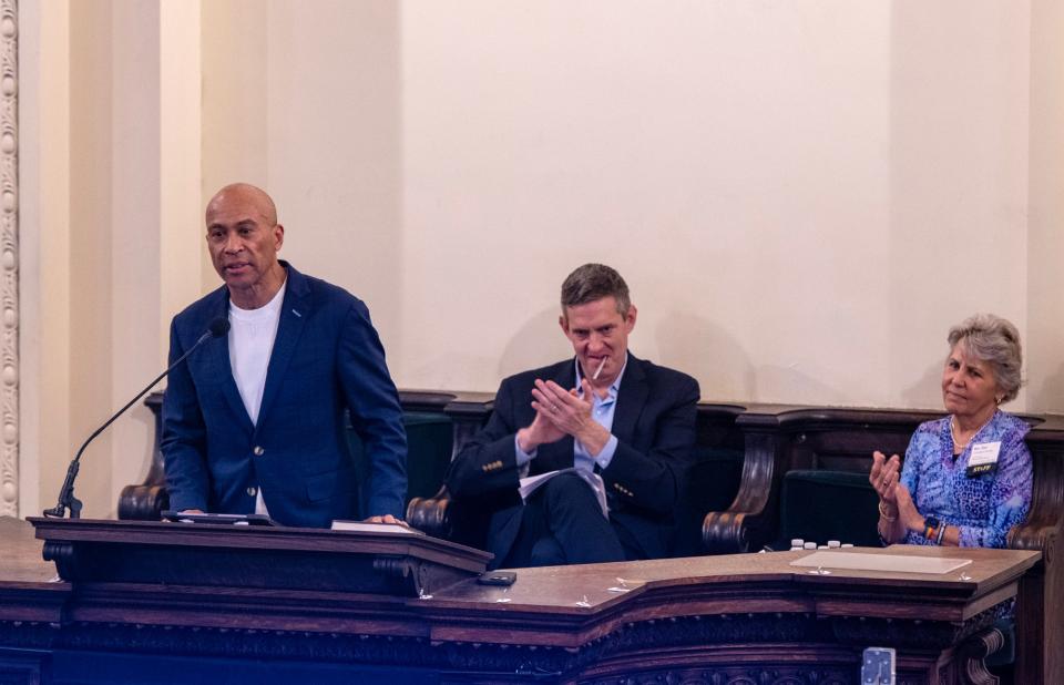 Former Gov. Deval Patrick speaks during an event to commemorate the twentieth anniversary of marriage equality at the Arlington Street Church in Boston Friday. Seated behind is Marc Solomon, former executive director of MassEquality, and Rev. Kim Crawford Harvie.
