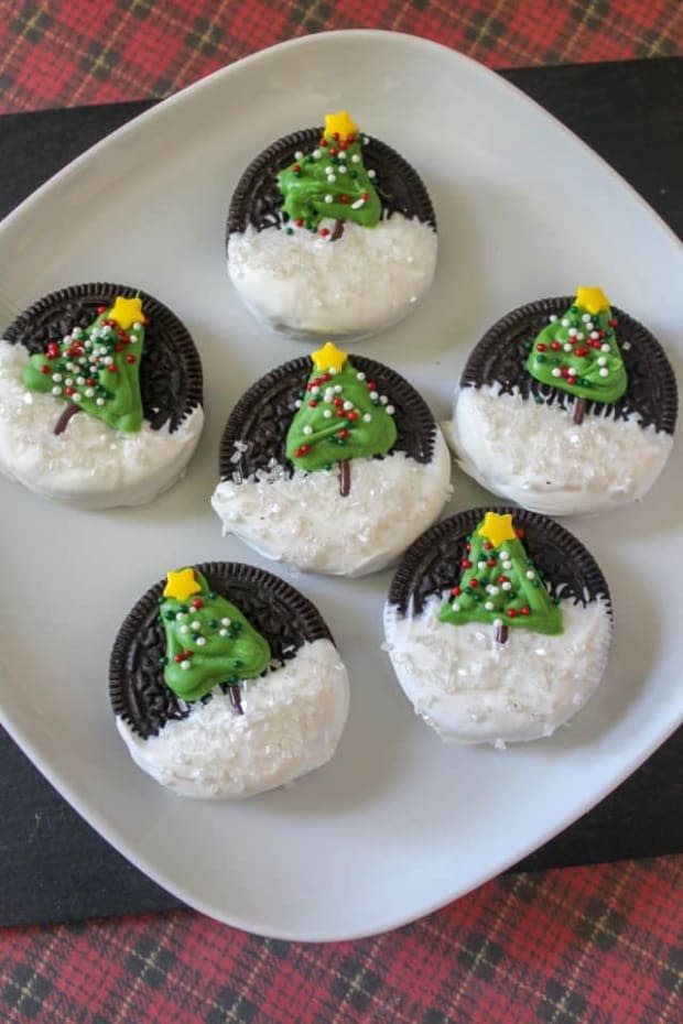 <p><a href="https://mooreorlesscooking.com/christmas-tree-oreo-cookies/" rel="nofollow noopener" target="_blank" data-ylk="slk:Moore Or Less Cooking;elm:context_link;itc:0;sec:content-canvas" class="link ">Moore Or Less Cooking</a></p>