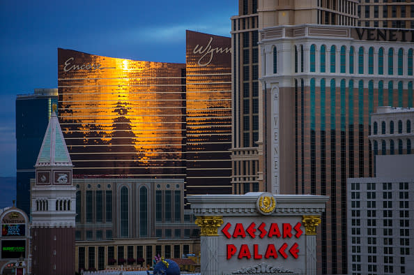 LAS VEGAS, NV - DECEMBER 7: The Venetian, Encore, and Wynn Hotels and Casinos are viewed at sunset in a photograph taken from Caesars Palace on December 7, 2015 in Las Vegas, Nevada. Tourism in America's 