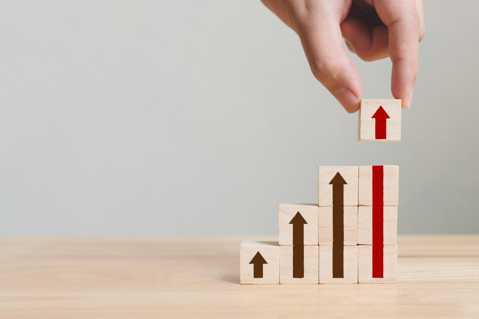 Building Blocks showing growth and upward pointing arrows.