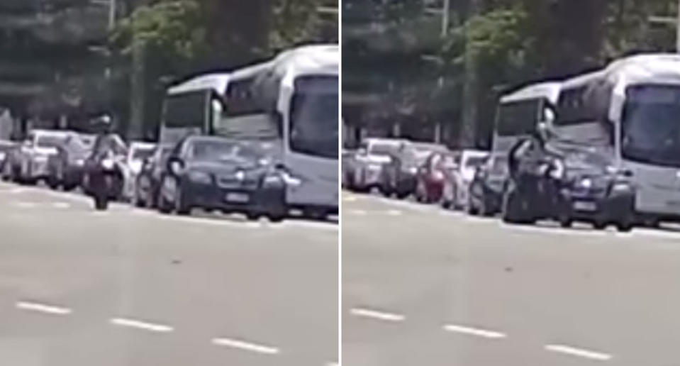 A motorbike rider overtakes a limo on the Gold Coast. The limo moves up and the rider appears to lash out with their foot. Source: Dash Cam Owners Australia