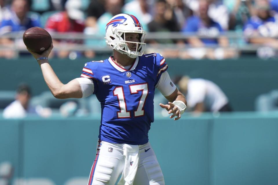 Buffalo Bills quarterback Josh Allen (17) makes a pass attempt against the Miami Dolphins.