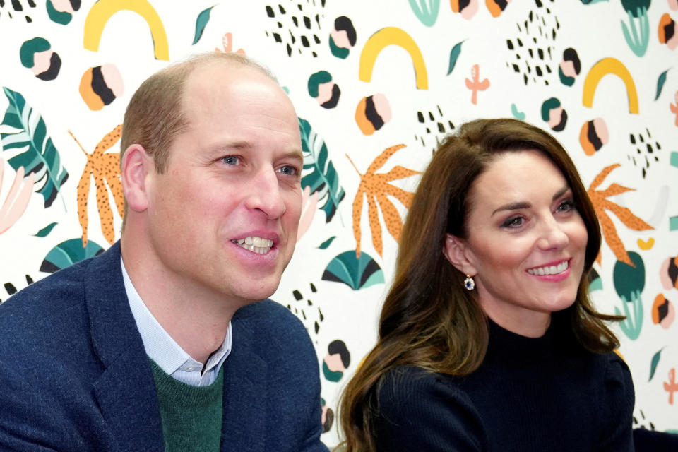 FILE PHOTO: Britain's Kate, Princess of Wales, and Prince William listen to young adults in the 'Mentoring Room' during a visit to the Open Door Charity, a charity aimed at supporting young adults across Merseyside with their mental health, using culture and creativity.  as a catalyst for change in Birkenhead, England, Thursday, January 12, 2023. Jon Super/Pool via REUTERS/File Photo