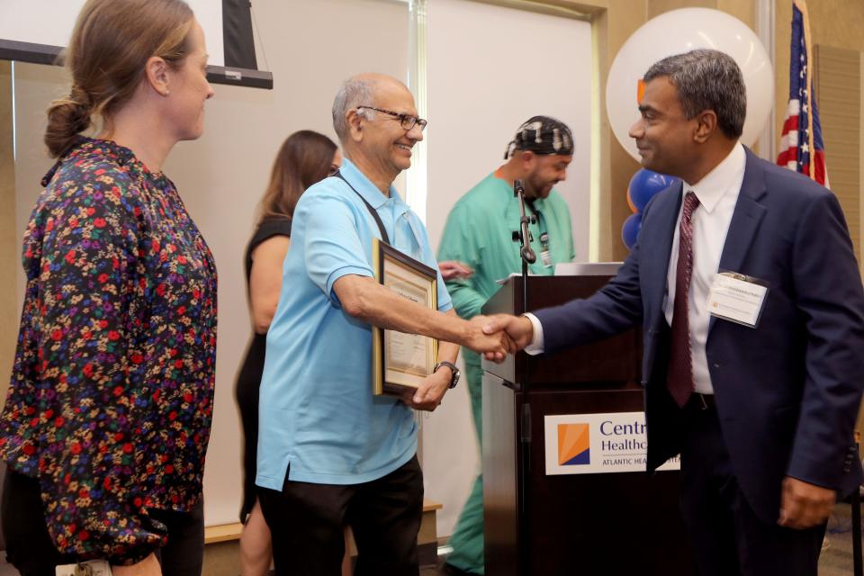 Jackson resident Mohammed Chaudhry shakes hands with Dr. Jatinchandra Patel, medical director of the Cadiovascular Interventional Laboratory at CentraState Medical Center in Freehold on August 31, 2023.