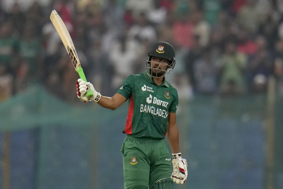 Bangladesh's Najmul Hossain Shanto celebrates scoring fifty runs during the first T20 cricket match between Bangladesh and England in Chattogram, Bangladesh, Thursday, March 9, 2023. (AP Photo/Aijaz Rahi)