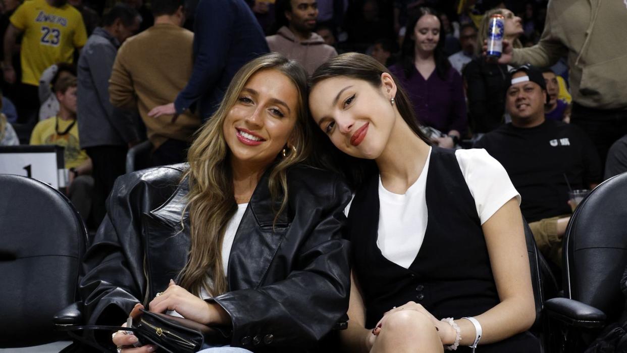 los angeles, california january 19 olivia rodrigo r at and tate mcrae attend the basketball game between the los angeles lakers and brooklyn nets cryptocom arena on january 19, 2024 in los angeles, california note to user user expressly acknowledges and agrees that, by downloading and or using this photograph, user is consenting to the terms and conditions of the getty images license agreement photo by kevork djanseziangetty images