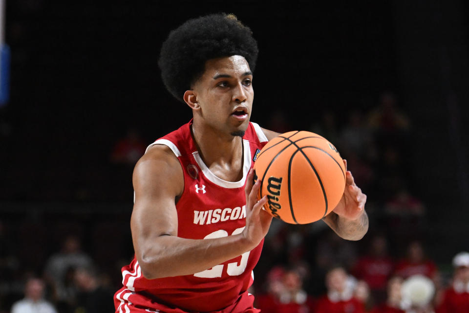 March 28, 2023; Las Vegas, Nevada; Wisconsin Badgers guard Chucky Hepburn (23) passes the ball against the North Texas Mean Green in the first half at Orleans Arena. Candice Ward-USA TODAY Sports