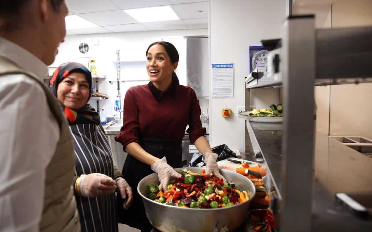 The Duchess of Sussex made a return visit to the kitchen in west London which inspired a charity cookbook - Getty Images Europe