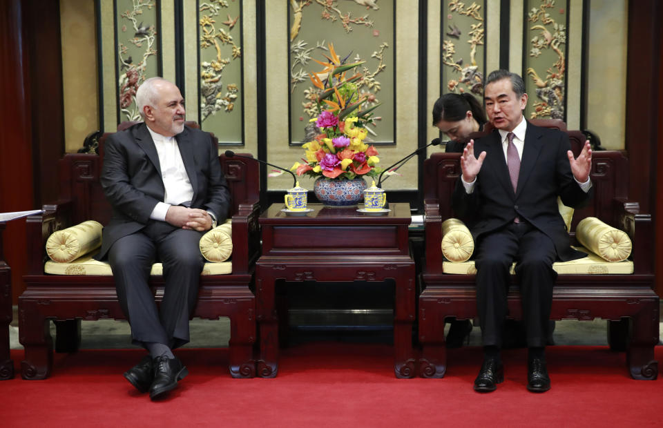 Iranian Foreign Minister Mohammad Javad Zarif, left, and his Chinese counterpart Wang Yi, right, during their meeting at the Diaoyutai State Guesthouse in Beijing, China, Tuesday, Feb. 19, 2019. The foreign ministers of China and Iran met in Beijing on Tuesday amid efforts to preserve the 2015 nuclear deal with Tehran.(How Hwee Young/Pool Photo via AP)