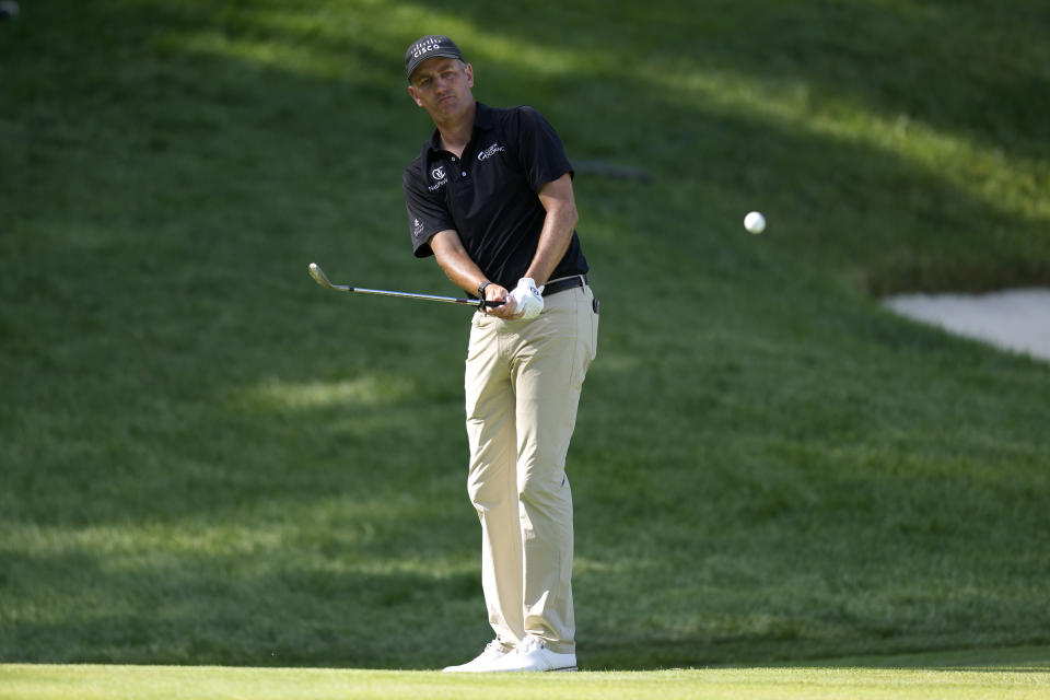 Brendon Todd chips on the 18th green during the final round of the John Deere Classic golf tournament, Sunday, July 9, 2023, at TPC Deere Run in Silvis, Ill. (AP Photo/Charlie Neibergall)