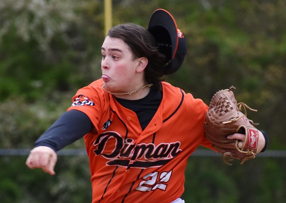 Diman starter Kole Andrade throws to the plate.