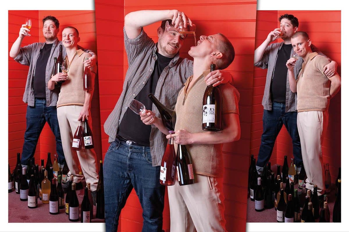 In vino veritas: chef Matthew Scott, left, pours wine into the mouth of his new business partner, natural wine expert Charlie Carr (Daniel Hambury/Stella Pictures Ltd)