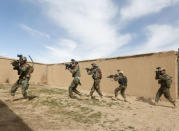 Afghan army Special Forces take part in a military exercise in Rishkhur district outside Kabul, Afghanistan March 12, 2017. Picture taken on March 12, 2017. REUTERS/Omar Sobhani