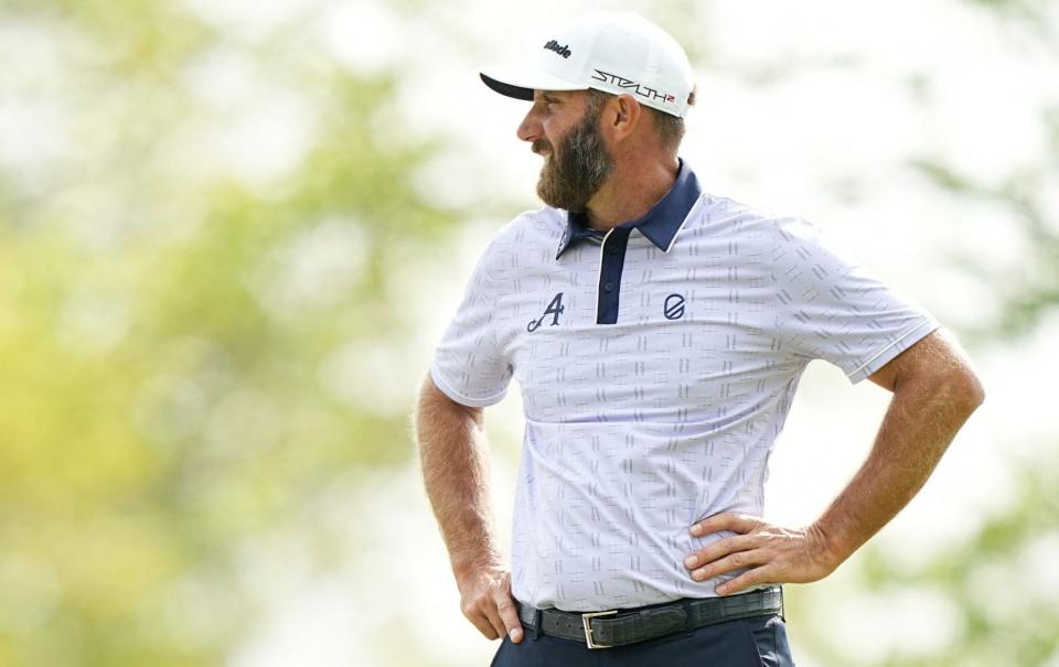 Dustin Johnson looks on as he moves up the leaderboard to two under par - Adam Cairns/USA TODAY Sports