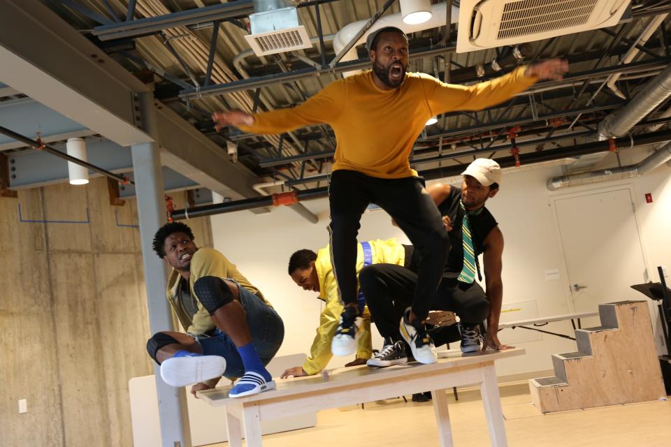 The cast of "Esai's Table" - from left to right, Cornelius Davidson, Dimitri Carter, Benton Greene and Marcus Gladney Jr. - rehearses for the JAG Productions play that ran in 2019 in White River Junction.