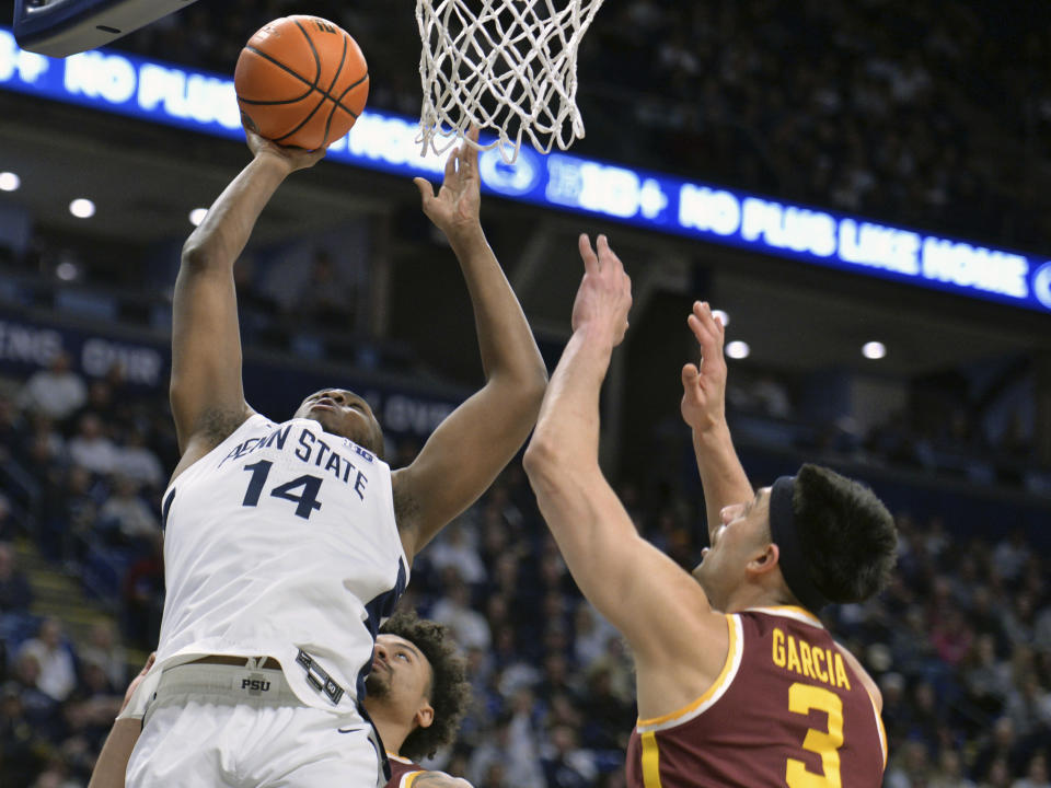 Penn State's Demetrius Lilley (14) shoots over Minnesota's Dawson Garcia (3) during the first half of an NCAA college basketball game Saturday, Jan. 27, 2024, in State College, Pa. (AP Photo/Gary M. Baranec)