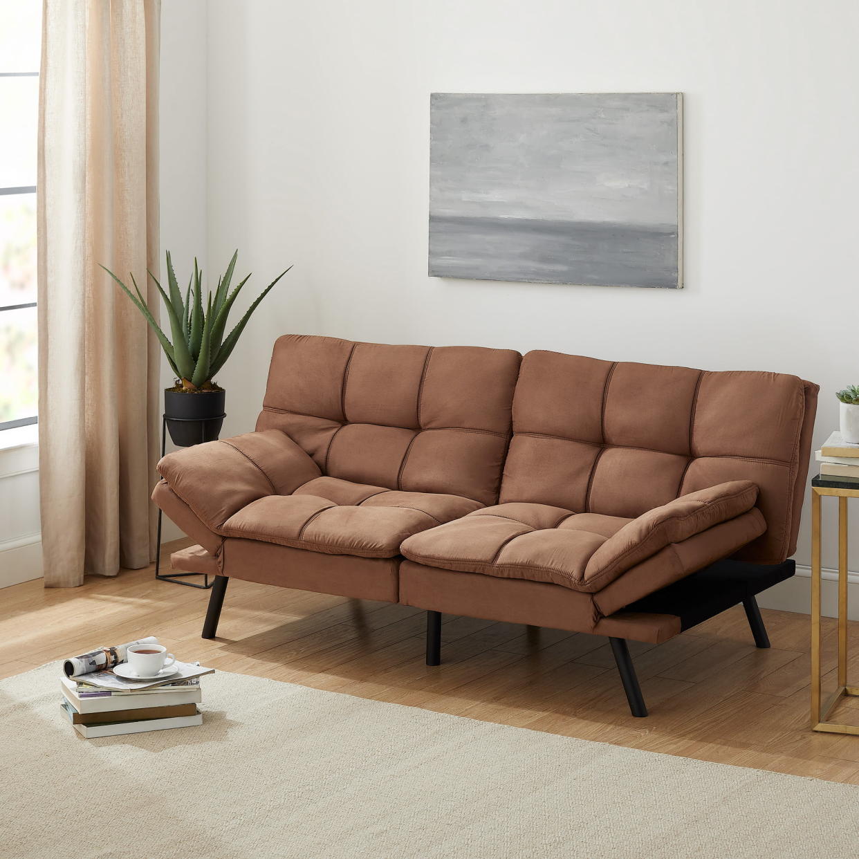 <p><a href="https://go.redirectingat.com?id=74968X1596630&url=https%3A%2F%2Fwww.walmart.com%2Fip%2FMainstays-Memory-Foam-Futon-Camel-Faux-Suede-Fabric%2F584274347&sref=https%3A%2F%2Fwww.goodhousekeeping.com%2Fhome-products%2Fg44521703%2Fbest-futons%2F" rel="nofollow noopener" target="_blank" data-ylk="slk:Shop Now;elm:context_link;itc:0;sec:content-canvas" class="link rapid-noclick-resp">Shop Now</a></p><p>Memory Foam Futon</p><p>$198.00</p><p>walmart.com</p>