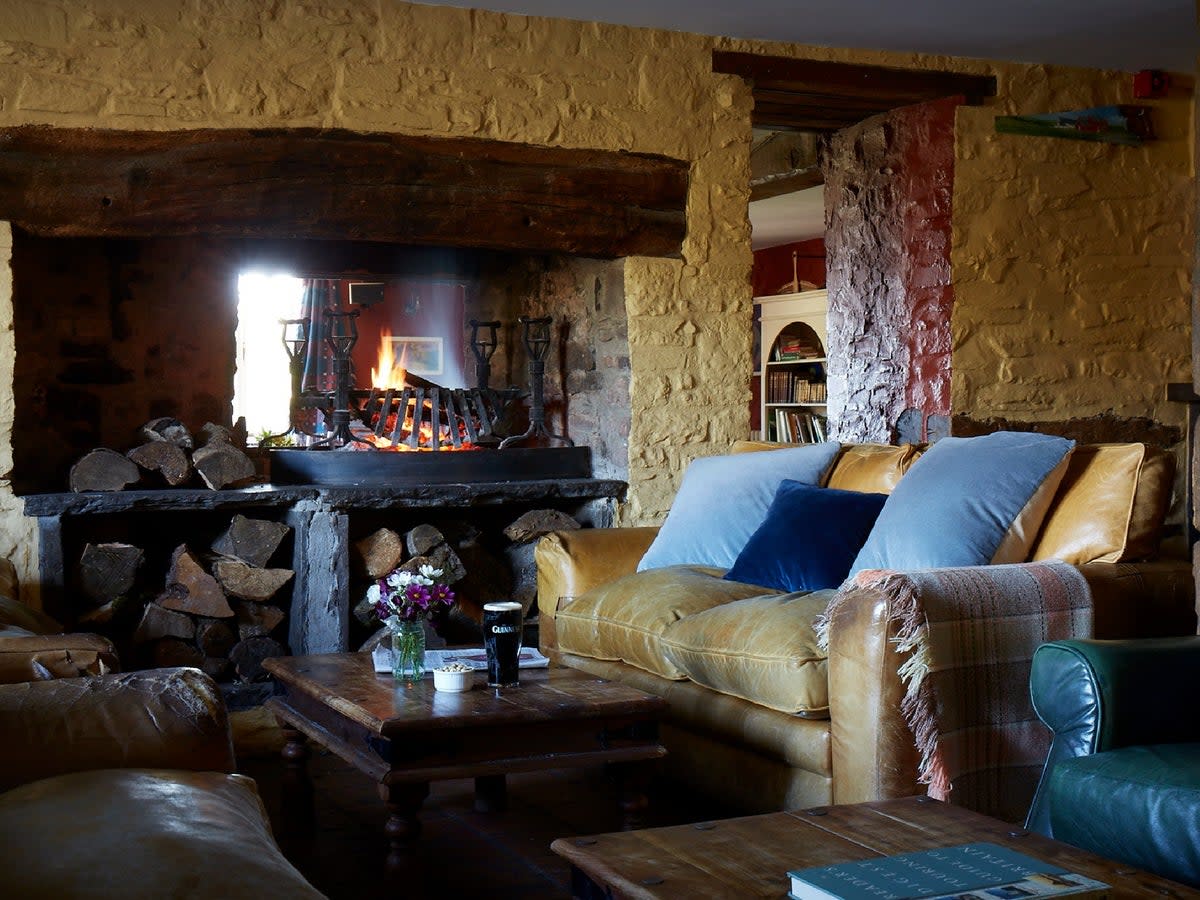 Antique furniture and colorful art make this an effortlessly cool place to stay (Felin Fach Griffin)