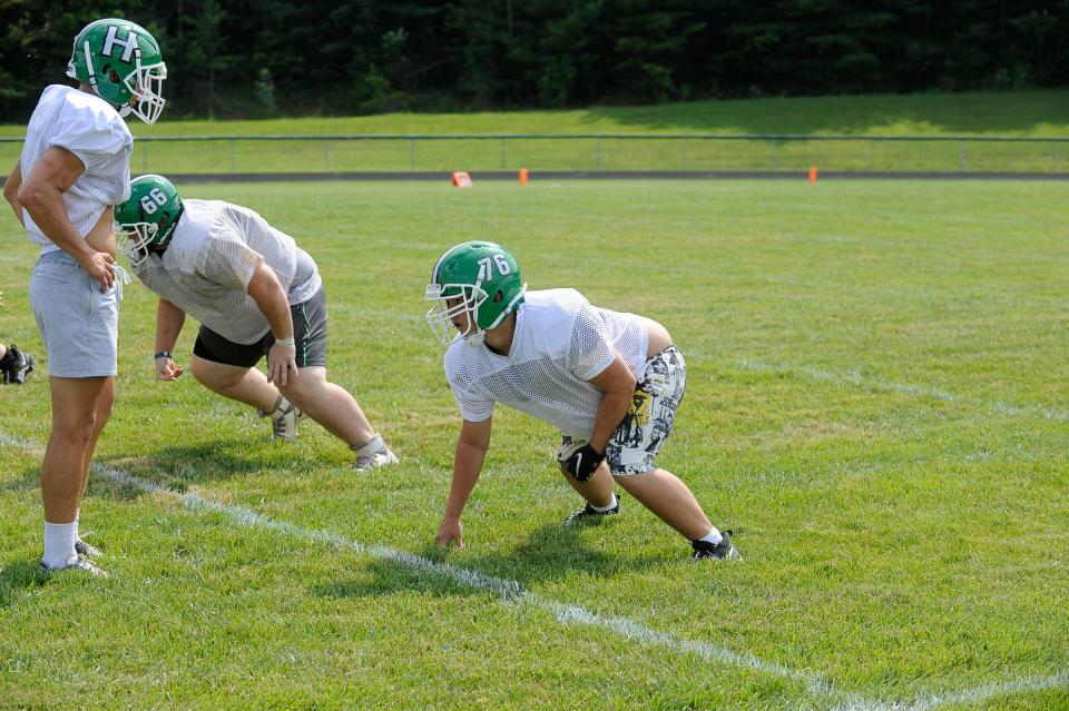 The Huntington Huntsmen undergo practice ahead of their 50th football season.