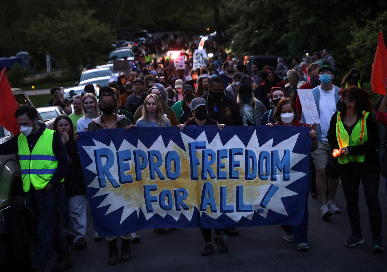 Demonstrators in support of reproductive rights march following a protest vigil outside Supreme Court Justice Samuel Alito's home in Alexandria, Va., on May 9. 