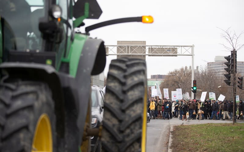 Farmers march and take tractors to the Papineau riding office of PM Trudeau to protest the lack of propane due to the CN Rail strike in Montreal