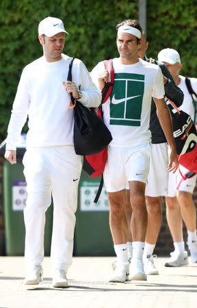 Britain Tennis - Wimbledon Preview - All England Lawn Tennis & Croquet Club, Wimbledon, England - 26/6/16 Switzerland's Roger Federer arrives for practice Reuters / Paul Childs Livepic