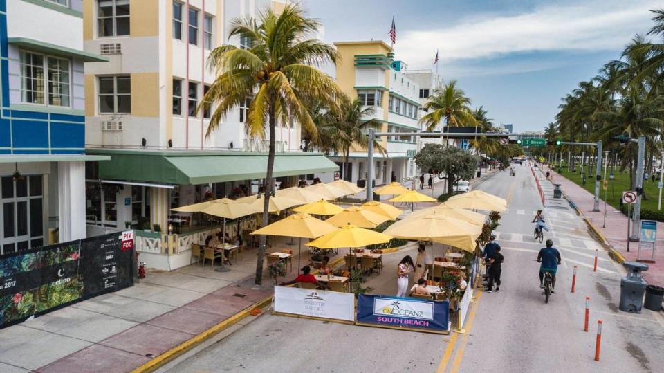 South Beach cafes have expanded onto street lanes closed to traffic on Ocean Drive.