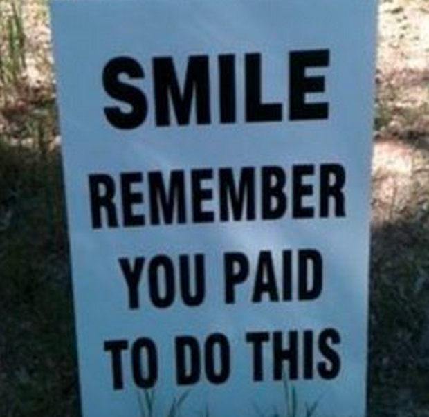 “SMILE — remember you paid to do this”