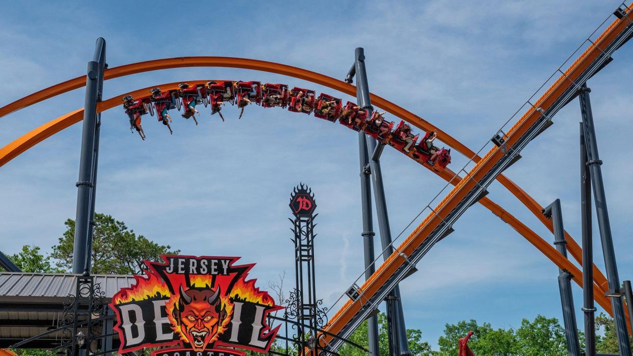 People riding upside down on Jersey Devil Coaster.