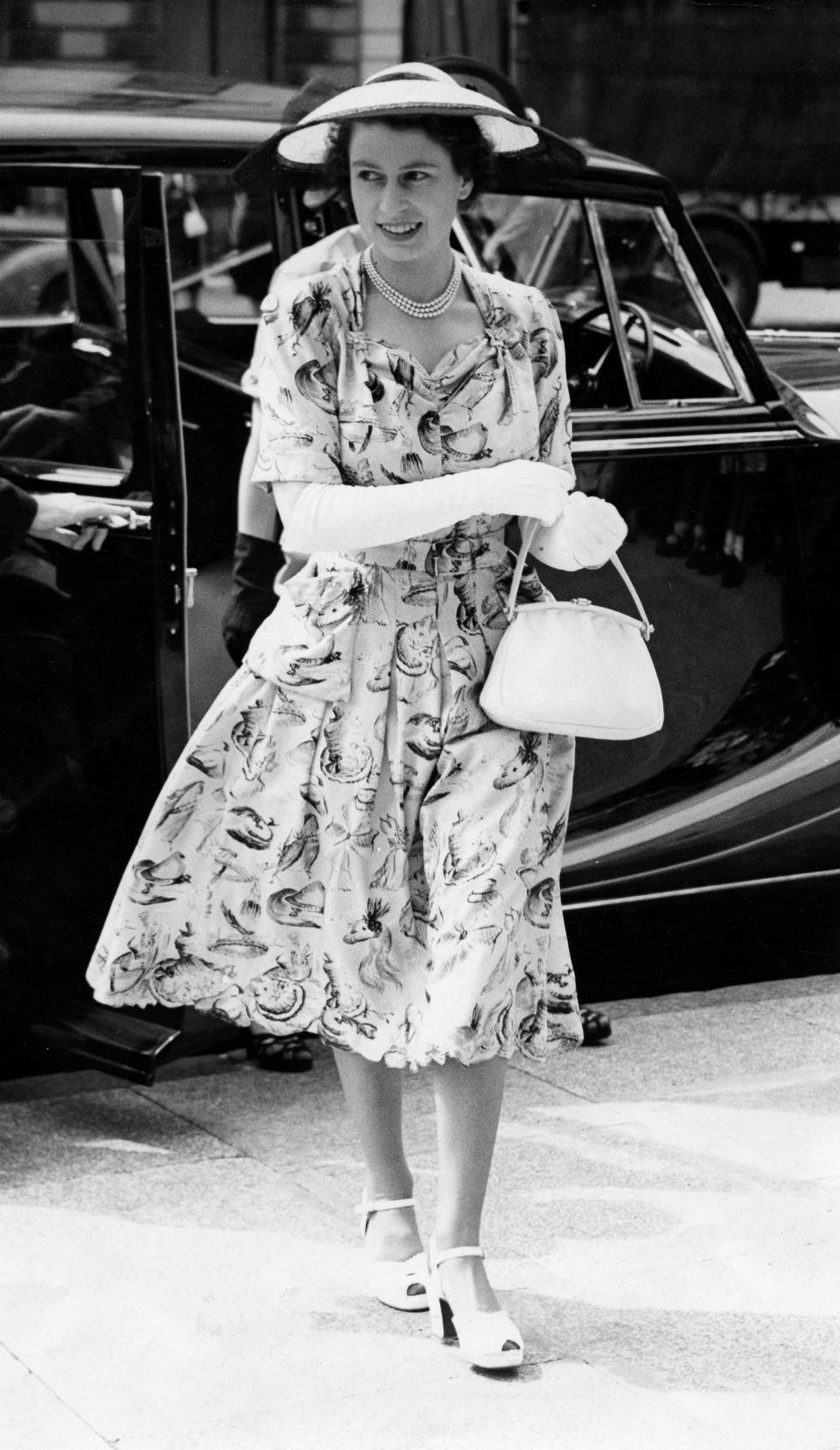 queen elizabeth wearing floral dress in 1951