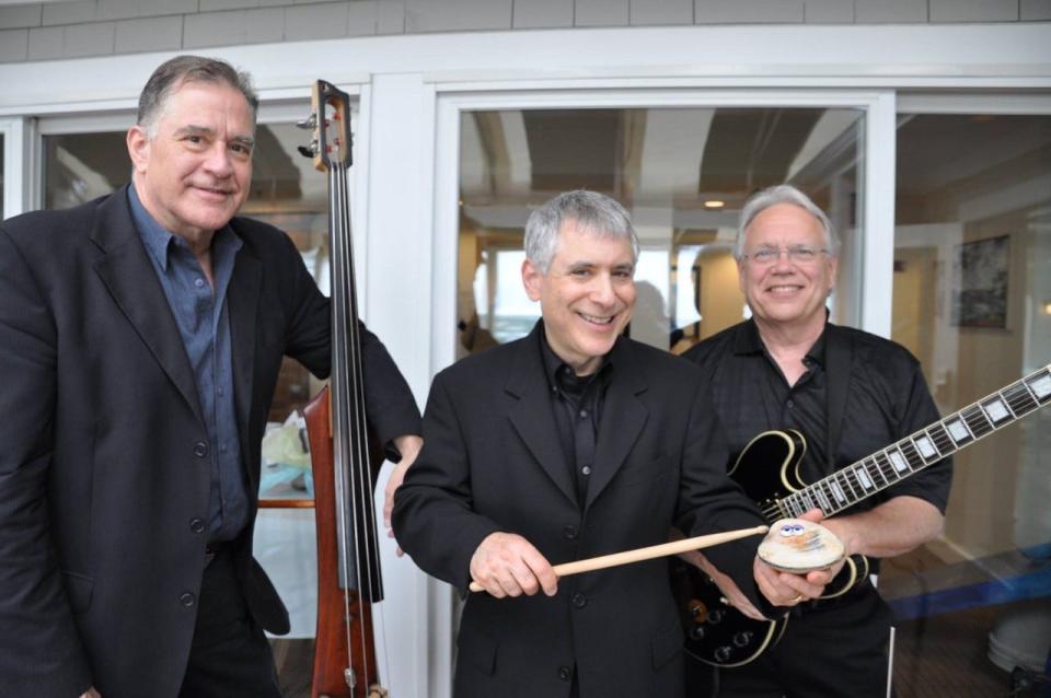 Drummer Bart Weisman, center, with his band (Steve Hambleton on guitar and Ron Ormsby on bass) will present a program on "A Century of Jazz" at the Cape Cod Museum of Art.