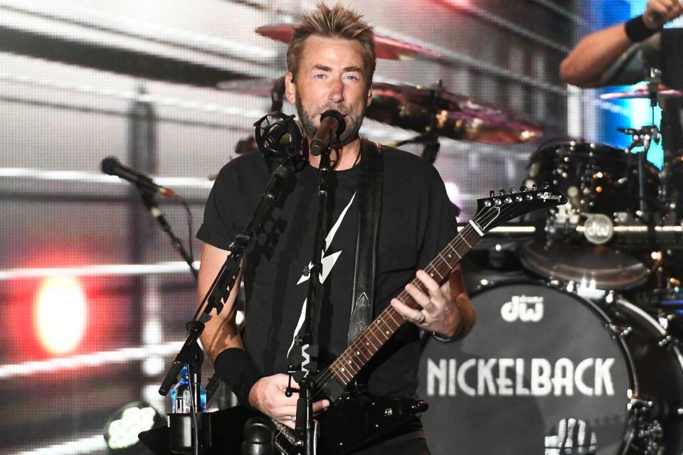 <p>Tim Mosenfelder/Getty</p> Chad Kroeger