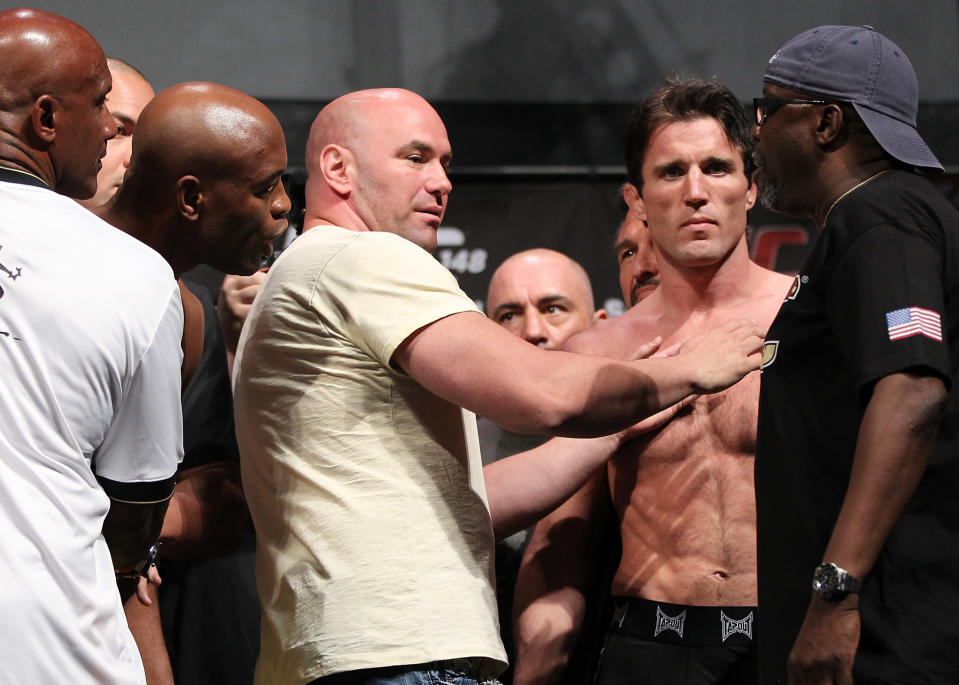LAS VEGAS, NV - JULY 6: UFC President Dana White separates Anderson Silva (L) and Chael Sonnen (R) during the UFC 148 Weigh In at the Mandalay Bay Events Center on July 6, 2012 in Las Vegas, Nevada. (Photo by Josh Hedges/Zuffa LLC/Zuffa LLC via Getty Images)