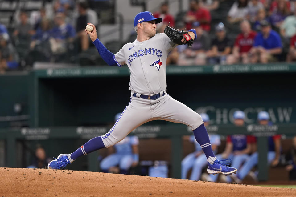 Toronto Blue Jays starting pitcher Trevor Richards throws during the first inning of a baseball game against the Texas Rangers in Arlington, Texas, Sunday, Sept. 11, 2022. (AP Photo/LM Otero)