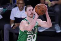 Boston Celtics' Gordon Hayward (20) attempts a shot during the second half of an NBA conference final playoff basketball game against the Miami Heat on Saturday, Sept. 19, 2020, in Lake Buena Vista, Fla. (AP Photo/Mark J. Terrill)