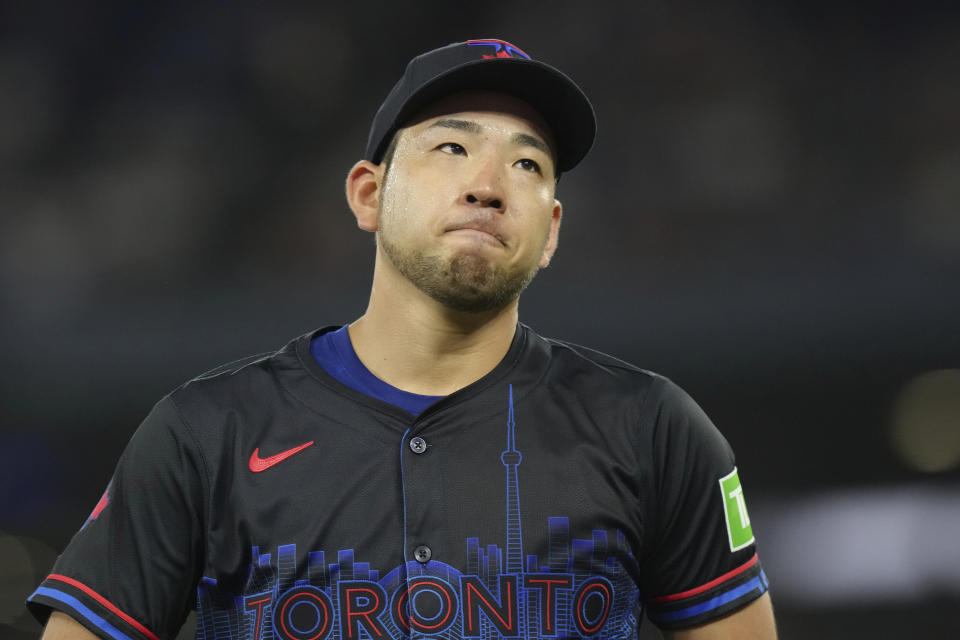 Toronto Blue Jays pitcher Yusei Kikuchi reacts after giving up a single to New York Yankees' Aaron Judge during the fourth inning of a baseball game Friday, June 28, 2024, in Toronto. (Chris Young/The Canadian Press via AP)