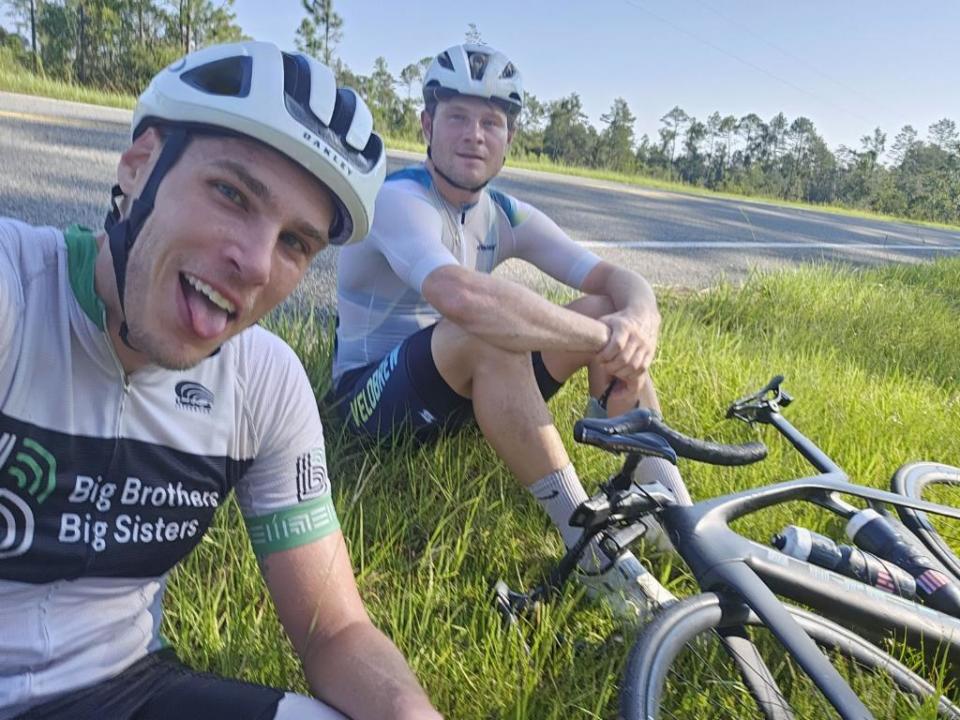 Jake Boykin, a noted cyclist and Florida State University doctoral student (right) and FSU School of Communication Assistant Director Jason Khan-Hohensee (left).