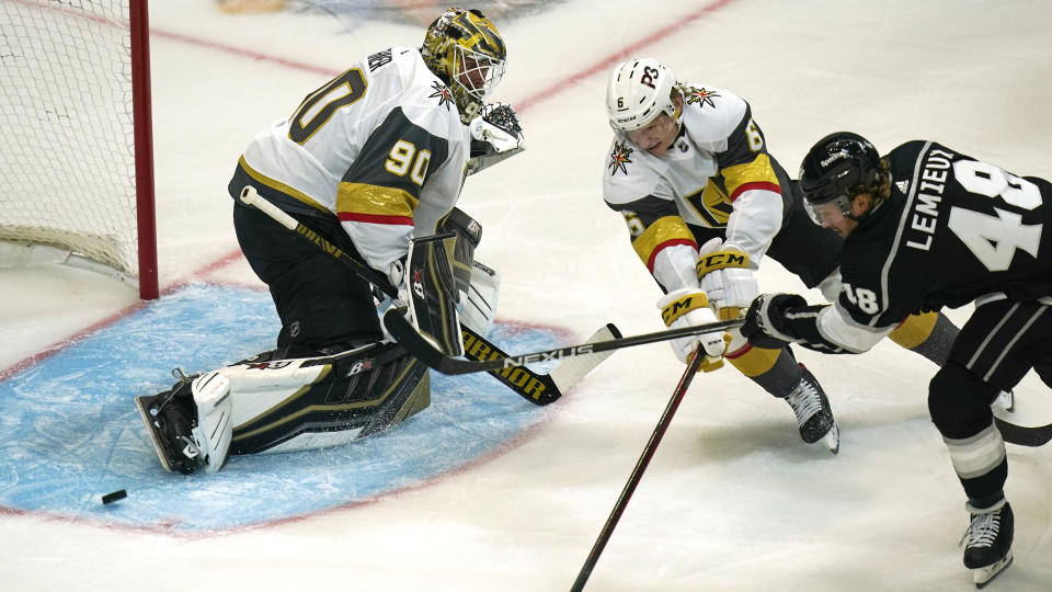 Los Angeles Kings left wing Brendan Lemieux (48) scores on Vegas Golden Knights goaltender Robin Lehner (90) during the first period of an NHL hockey preseason game Thursday, Sept. 30, 2021, in Salt Lake City. (AP Photo/Rick Bowmer)