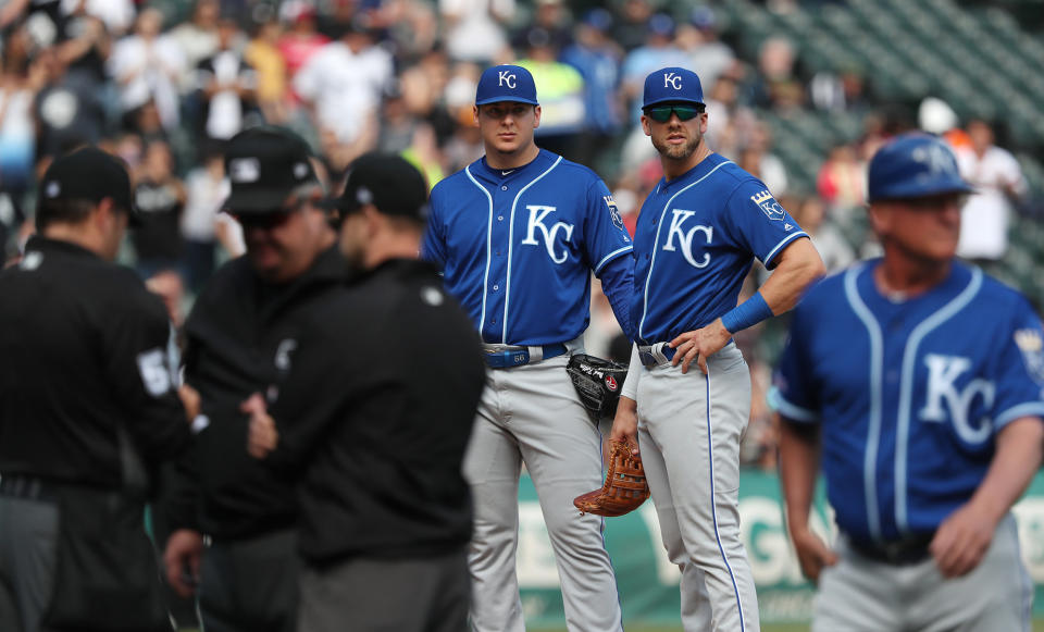 Royals pitcher Brad Keller, middle, kept up one of baseball's most ridiculous traditions last Wednesday. (John J. Kim/Chicago Tribune/TNS)