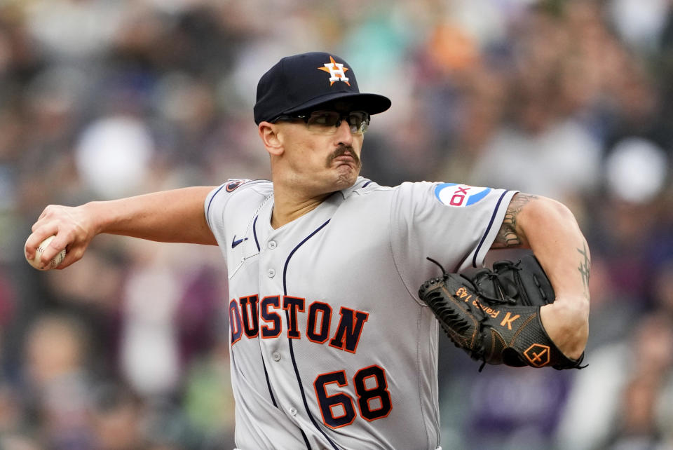 Houston Astros starting pitcher J.P. France throws against the Seattle Mariners during the first inning of a baseball game Saturday, May 6, 2023, in Seattle. (AP Photo/Lindsey Wasson)