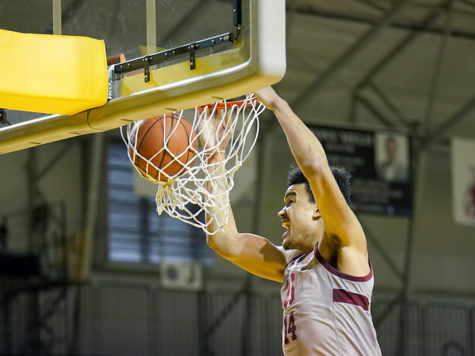 Stanford forward Spencer Jones (14) ducks against UCLA during the first half of an NCAA college basketball game in Santa Cruz, Calif., Saturday, Jan. 23, 2021. (AP Photo/Tony Avelar)