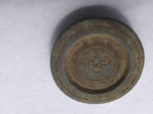 Another one of the items found at the archaeology dig site was a weight that had been used to balance a scale in the 1800s in Colonial Michilimackinac.