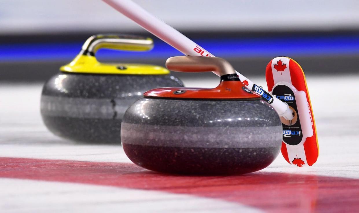 CBC podcast Good Question, Saskatchewan explores why people in Saskatchewan love curling so much. (Sean Kilpatrick/The Canadian Press - image credit)