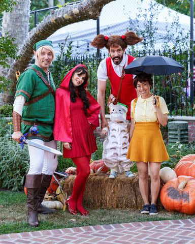 <p>Lindy Lin Photography</p> Jonathan Scott and Zooey Deschanel with Drew Scott, Linda Phan and son Parker