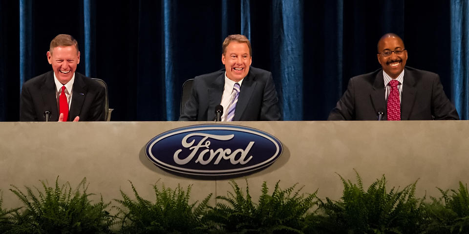 Executive Chairman for Ford Motor Company William Ford, center, Ford President and CEO Alan Mulally, left, and Bradley Gayton share a laugh during the company's annual shareholders meeting at the Hotel DuPont in Wilmington, Del., Thursday, May 10, 2012. Thursday's meeting lasted only 45 minutes, much of it spent with shareholders praising CEO Alan Mulally and Executive Chairman Bill Ford Jr. for the company's turnaround. (AP Photo/Ron Soliman)