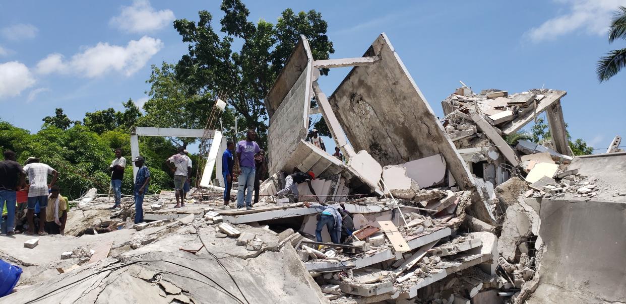 The backside of the residence of the Catholic bishop is damaged after an earthquake in Les Cayes, Haiti, Saturday, Aug. 14, 2021.