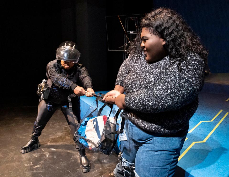 Some of the character struggles in the science-fiction comedy "Launch Day (Love Stories from the Year 2108)" are more literal than others, as in this scene featuring Ebony Wesley, at left, playing Quillney, and Amaria Jackson as Garal. The world-premiere of the award-winning play by Michael Higgins opens Friday in Theatre Tuscaloosa's Bean-Brown Theatre.